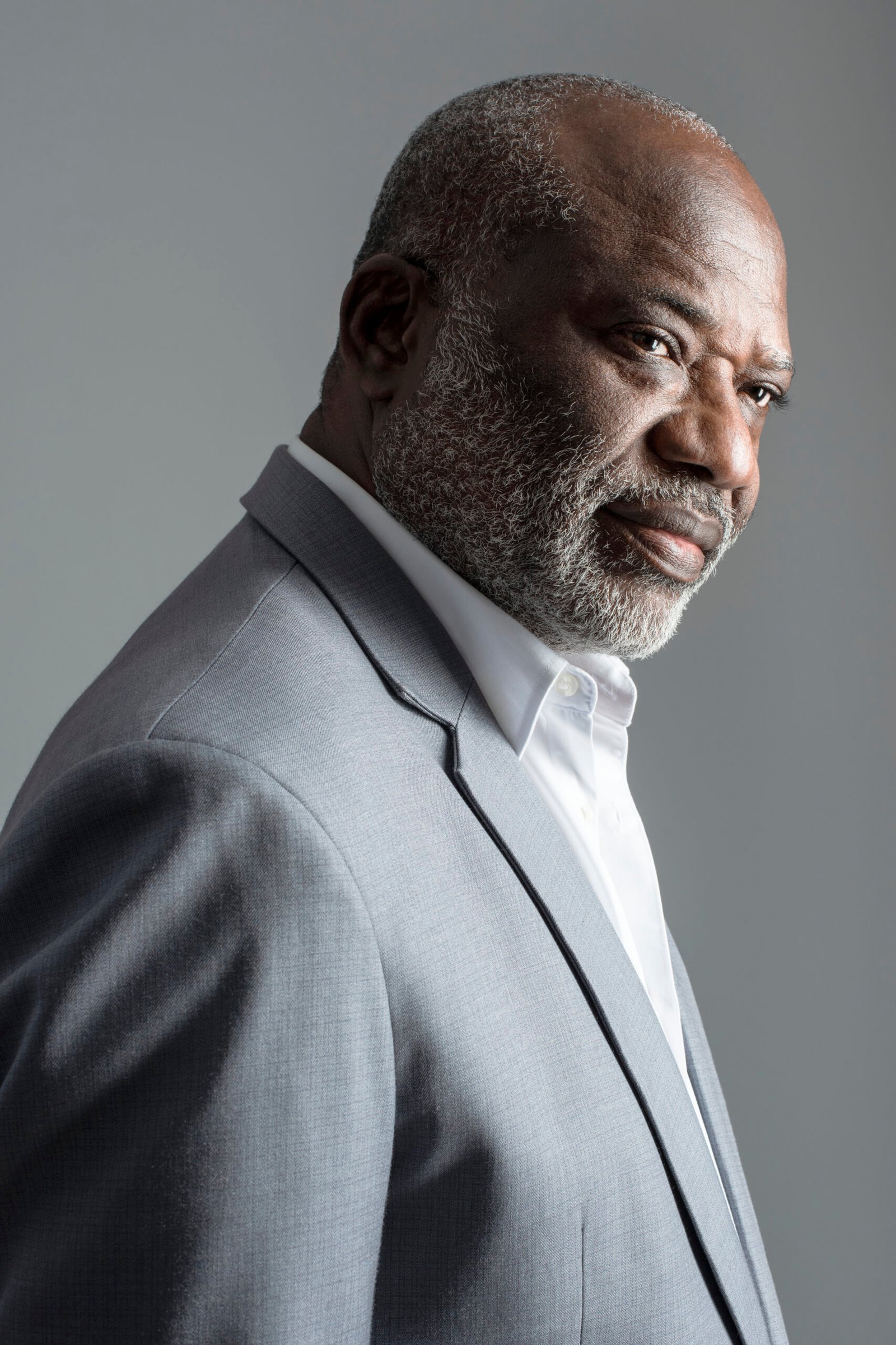 african-american-businessman-gray-suit-studio-portrait-scaled